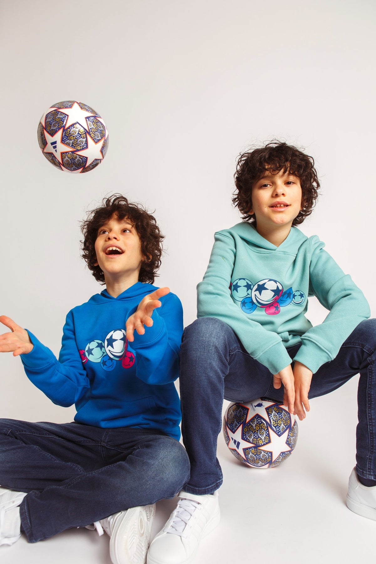 UCL Smiling Starball Kinder Kapuzenpullover – Teal Monstera